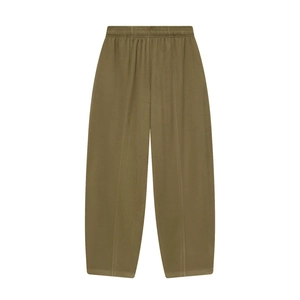 Detail of olive green joggers featuring elastic waistband and vertical front seam design