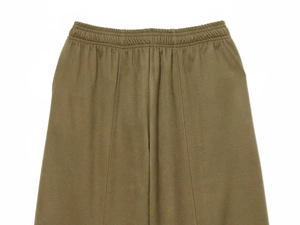Detail of olive brown casual trousers showing elastic waistband and decorative topstitching