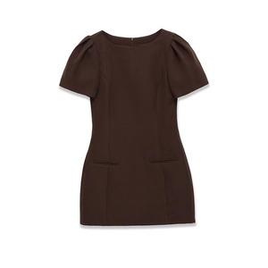 Detail view of brown puff sleeve mini dress with crew neck and decorative pockets
