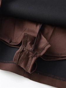 Detail of slim fit mini dress showing inner safety lining and reinforced stitching