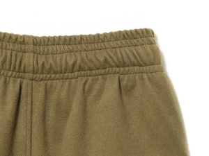 Detail of wide elastic waistband with parallel stitching on thermal fleece trousers