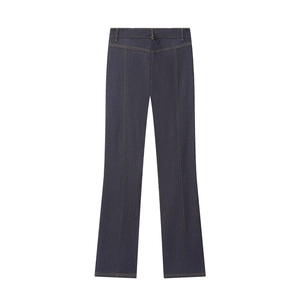 Detail view of dark blue denim trousers with contrast yellow stitching on high-density fabric