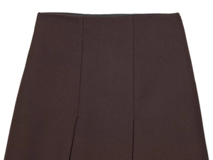 Détail du tissu sergé marron foncé avec coutures à la taille d'une jupe tailleur