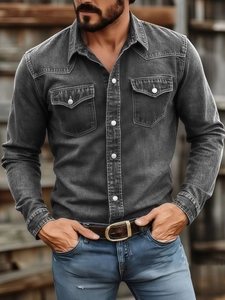 Detail view of dark grey slim-fit denim shirt with western pearl snaps and chest pockets