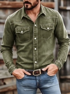 Detail of washed olive green shirt with dual chest pockets and white buttons