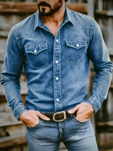 Close-up of men's long-sleeve denim shirt featuring double chest pockets and pearl buttons