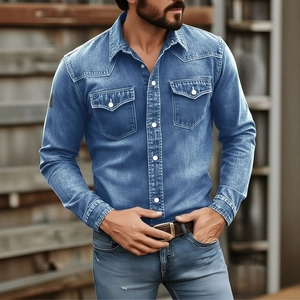 Close-up of deep blue denim shirt featuring dual flap pockets and classic white buttons