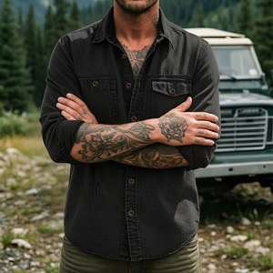 Close-up of slim-fit men's long sleeve outdoor denim shirt with dual brown button pockets