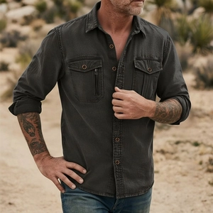 Detail of dark grey cotton cargo shirt with double pockets and reinforced shoulders