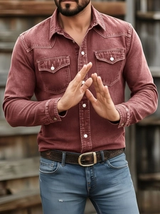 Detail view of retro red long sleeve shirt with vintage wash texture and buttoned pockets