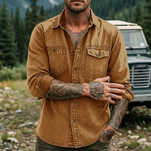 Detail of washed brown men's utility shirt with double flap pockets and retro texture