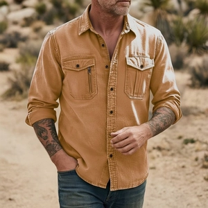 Outdoor shot of men's cotton-linen button-up shirt in mustard yellow with dual chest pockets