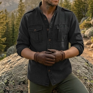Close-up of black tactical shirt featuring chest pockets and shoulder epaulets details