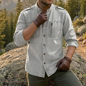 Detail of grey men's tactical cotton shirt featuring stand collar and zipper pocket