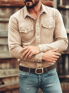Close-up of khaki long sleeve cargo shirt featuring classic buttoned double chest pockets