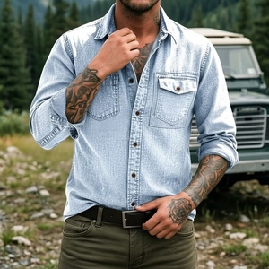 Classic light blue denim shirt for men featuring dual chest pockets in outdoor setting