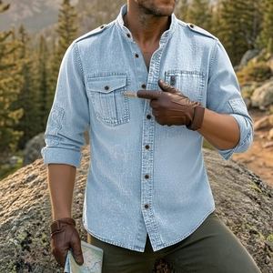 Close-up of men's light blue cotton linen shirt with military pockets and epaulets