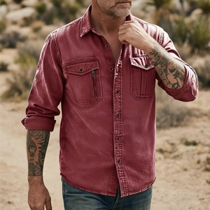 Detail of red cotton linen shirt featuring metal buttons and vertical zipper pocket design