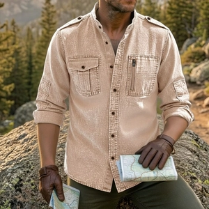 Detail of a khaki long sleeve outdoor work shirt with shoulder straps and double chest pockets