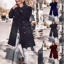 Detail view of double-breasted wool coat showing metal buttons and lapel design