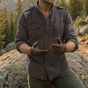 Close-up of tactical military style shirt showing cargo pockets and epaulettes on shoulder