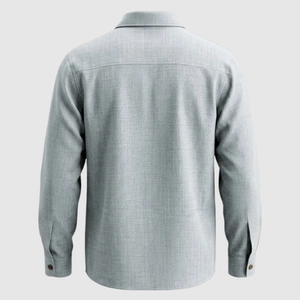 Dettaglio posteriore di una camicia a maniche lunghe azzurra con trama del tessuto