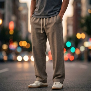 Dettaglio della vita con coulisse sui pantaloni casual da uomo in tessuto testurizzato