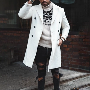 Street style view of men's white double-breasted wool coat with black buttons