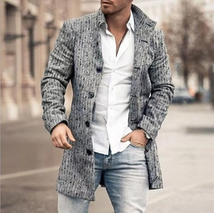 Detail of grey woolen coat texture with stand collar and dark buttons for men