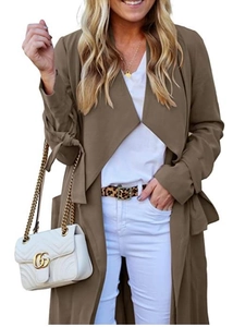 Detail of a khaki women's mid-length trench coat featuring unique cuff tie-up ribbons