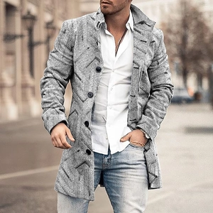 Close-up of men's wool blend overcoat featuring grey plaid texture and decorative stitching