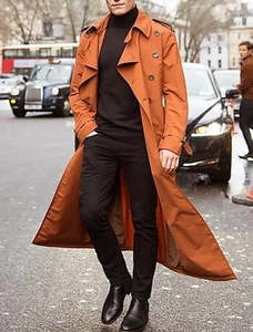Men's double-breasted long trench coat in rust orange with classic epaulettes and lapels