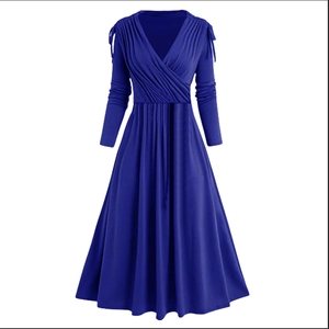 Royal blue long-sleeved dress featuring a deep V-neckline and elegant pleated waist detail