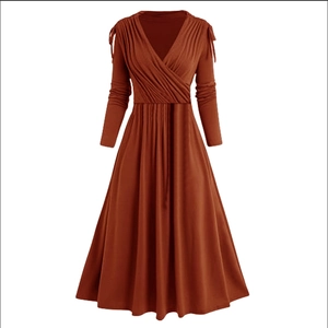 Elegant caramel long sleeve maxi dress with V-neck wrap design and pleated A-line skirt