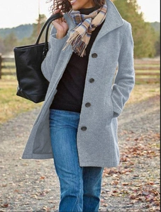 Mid-length gray wool blend coat for women featuring a lapel collar and single-breasted design