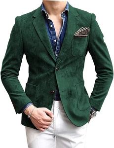 Detail of moss green suede blazer featuring notched lapels and dual-button closure