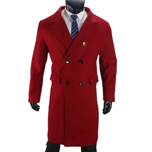 Detail of red wool blend double-breasted coat with classic black buttons and lapel