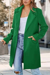 Detail of green mid-length wool coat featuring notched lapels and single-button closure