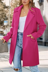 Outdoor shot of hot pink wool blend coat with wide lapels and a single button closure