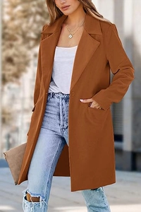 Detail of a brown wool coat featuring a notch lapel and single button closure for winter