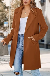 Detail of caramel wool coat showing peak lapels and single button closure for women