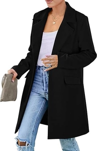 Close-up of black mid-length blazer featuring lapel collar and flap pockets detail