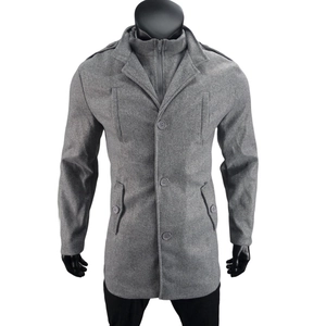 Detail of grey wool coat featuring a layered faux-two-piece zipper collar design