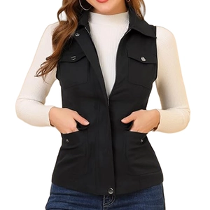 Close-up of black women's utility vest with four functional pockets and zipper detail
