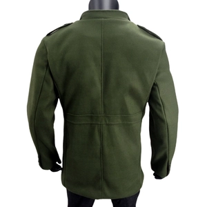 Detail view of the military green wool coat back with epaulettes and structured seams