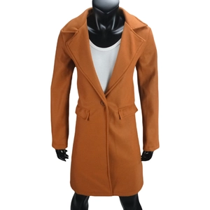 Detail of single-button closure and pocket flaps on brown long wool coat for men