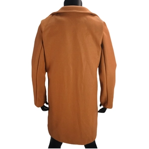 Rear view detail of camel wool blend coat featuring clean cut and tailored lapel