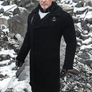 Men's winter black suede coat with plush collar and double-breasted buttons in snow