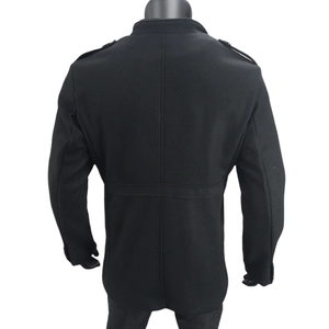 Detail view of the epaulettes and tailored back seams on this black wool coat for men