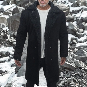 Detail of men's winter suede coat with warm black faux shearling lining and double buttons